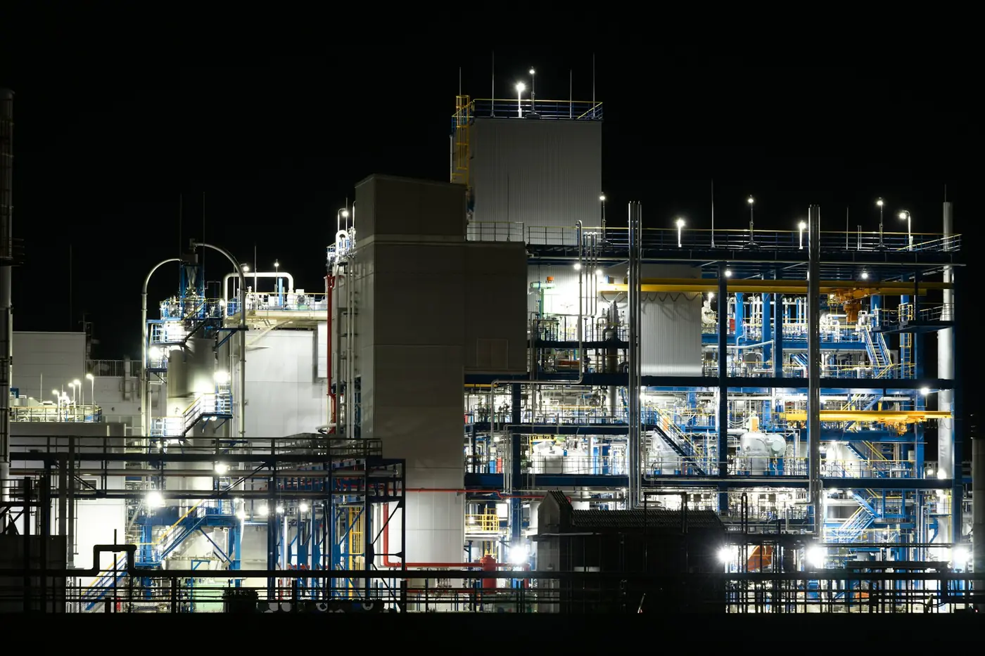 A chemical plant lit up at night